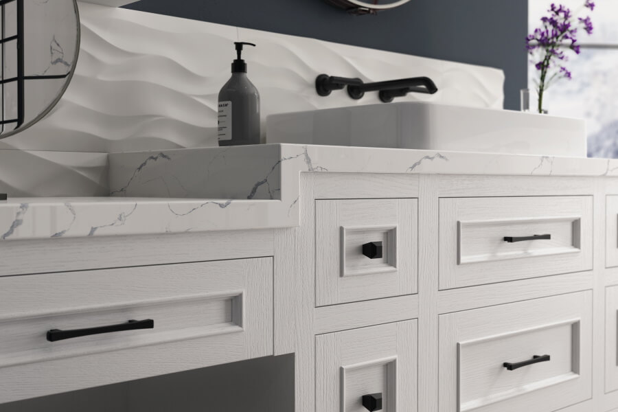 A bathroom vanity with a textured painted oak wood in a white paint color.