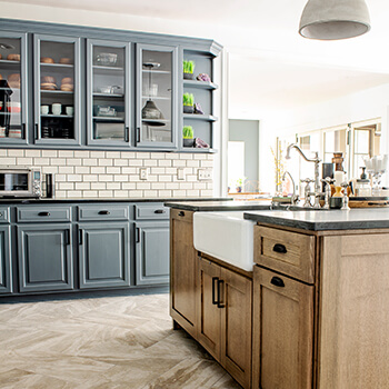 An on-trend kitchen design with new trendy cabinet colors from Dura Supreme Cabinetry.