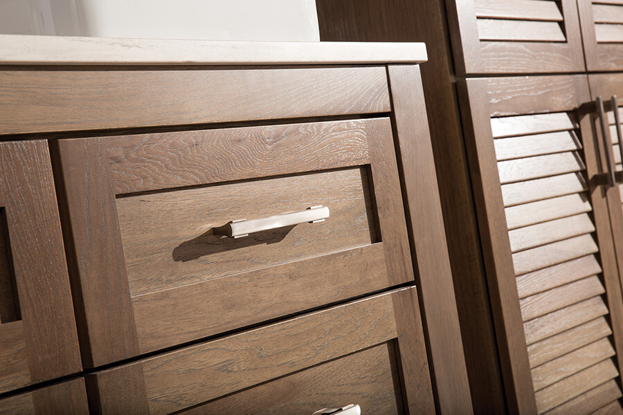 Cutting-edge kitchen design and color trends. True-Brown stained cabinets are growing in popularity and will soon be a mainstream trend for kitchen & bath designs nationwide. This bathroom vanity has a medium true-brown stain on hickory wood vanity cabinets.