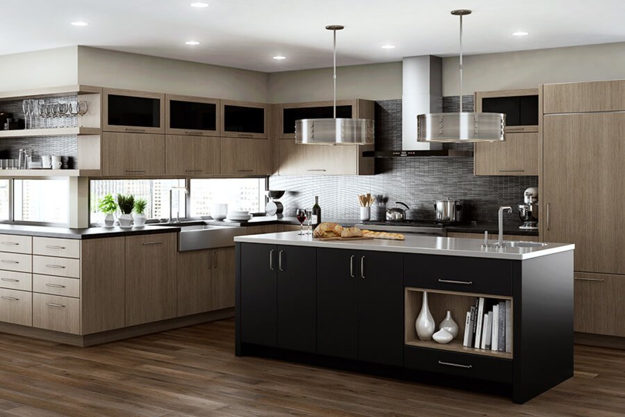 A modern city kitchen remodeled with quarter-sawn oak cabinets with a gray-brown stained color and a black painted kitchen island.