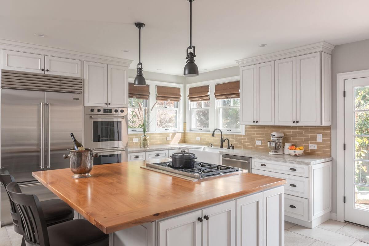 A classic kitchen design with white painted cabinets and beautiful styling.