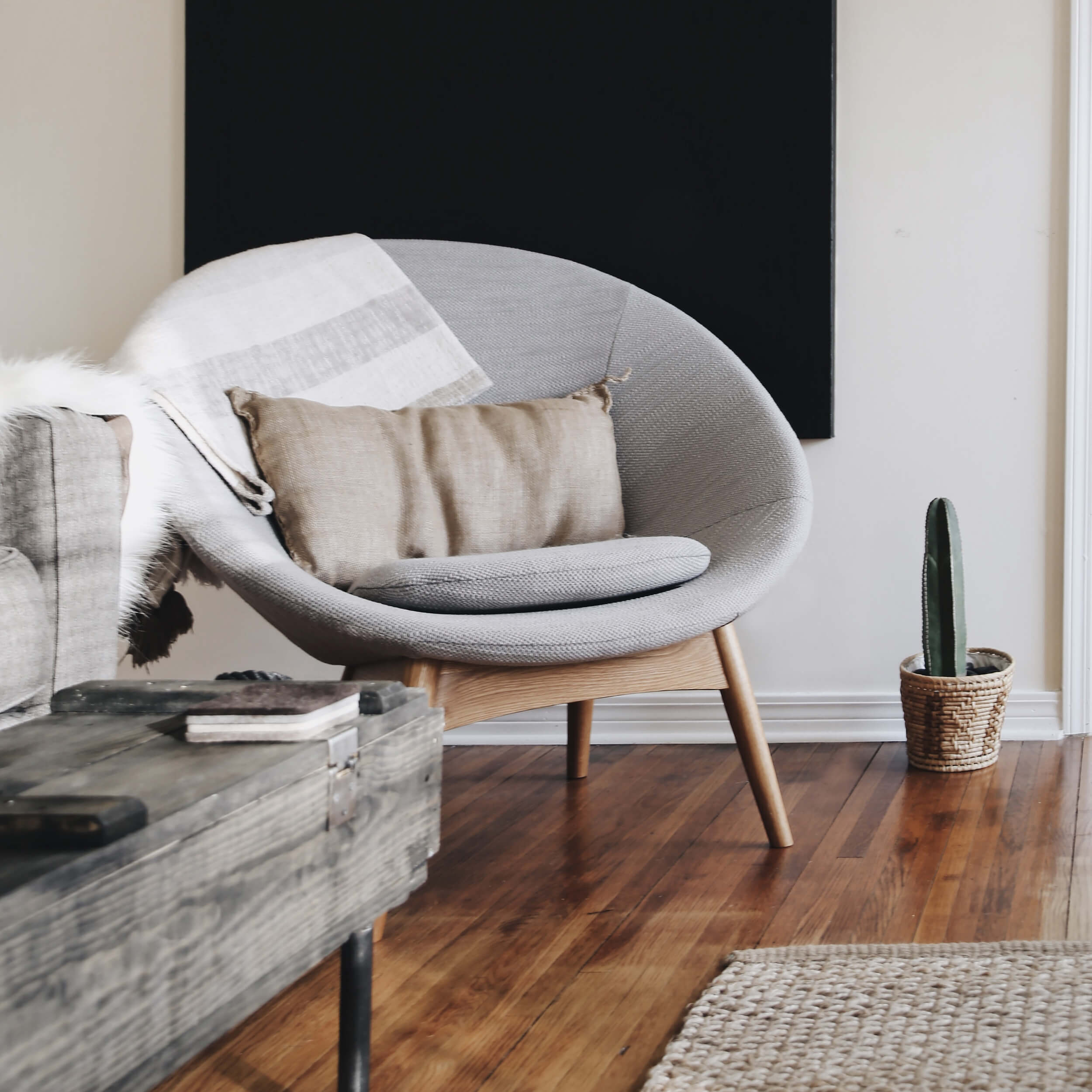 A living room with rustic Scandinavian decor and furniture.