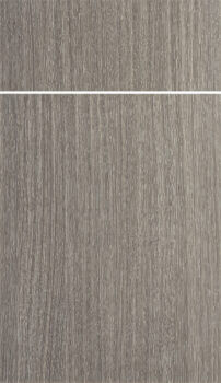 Dura Supreme’s Alpine door style is a contemporary slab door that is crafted with a durable high pressure laminate surface. The door is shown here in a gray textured wood grain called Boardwalk Oak.