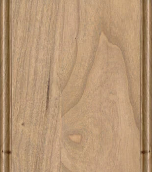 This finish color for Cherry kitchen & bath cabinets is shown in the Coriander stained finish by Dura Supreme Cabinetry. A light, raw, natural color with a soft brown undertone that emphasizes the wood grain and character.