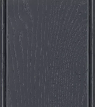 Dura Supreme’s Cyberspace Painted Oak is a dark, almost black, neutral navy blue color with the wood grain texture of natural oak. It's a popular & trendy look for kitchen and bath cabinetry.
