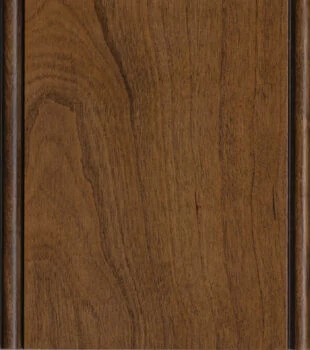 This finish color for Cherry kitchen & bath cabinets is shown in the Hazelnut stain by Dura Supreme Cabinetry. This cabinet color is a true brown stain with a natural brown undertone.