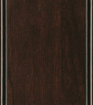 This finish color for Cherry kitchen & bath cabinets is shown in the dark Java stain by Dura Supreme Cabinetry. This cabinet color is a deep, striking stain with a tint of a reddish undertone.