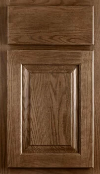 The Porter standard overlay cabinet door style has traditional raised panels with refined edge profiles with a classic slab drawer front.
