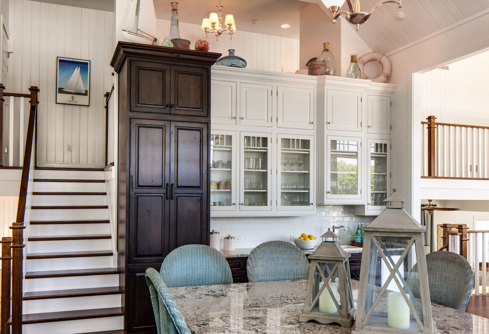 Dura Supreme Knotty Alder cabinets in dark Patina Stained finish. Design by Kim Hoegger of Kim Hoegger Home, Texas.