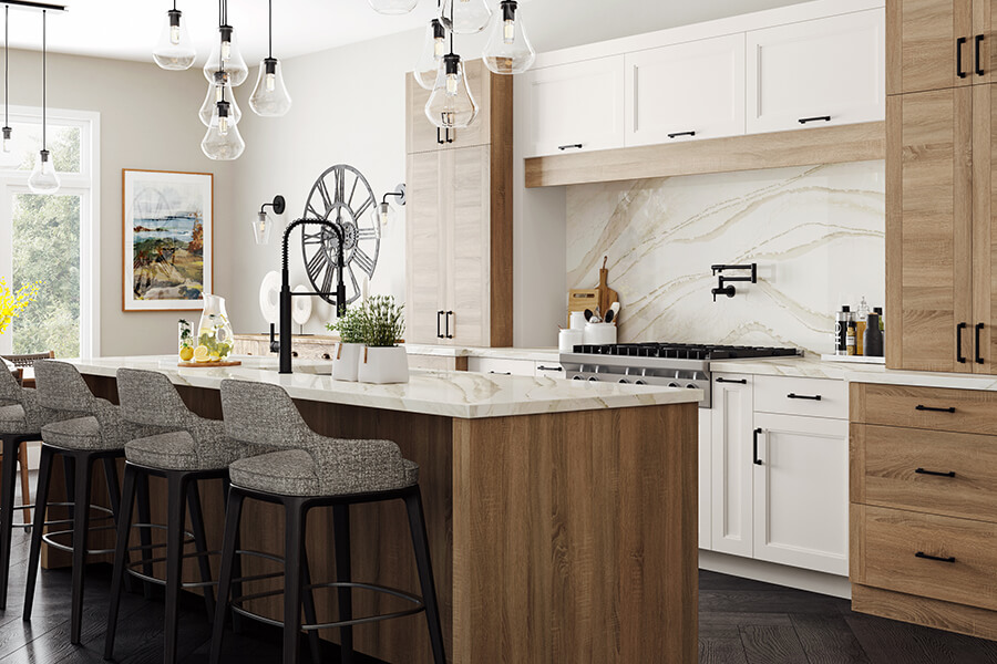 A modern Scandinavian style kitchen with textured oak and off-white painted cabinets with frameless construction cabinetry.
