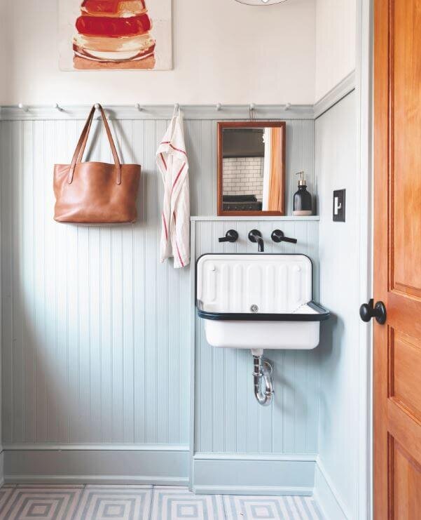 Hand washing sink by entry, Design by Airy Kitchens in Philadelphia, PA