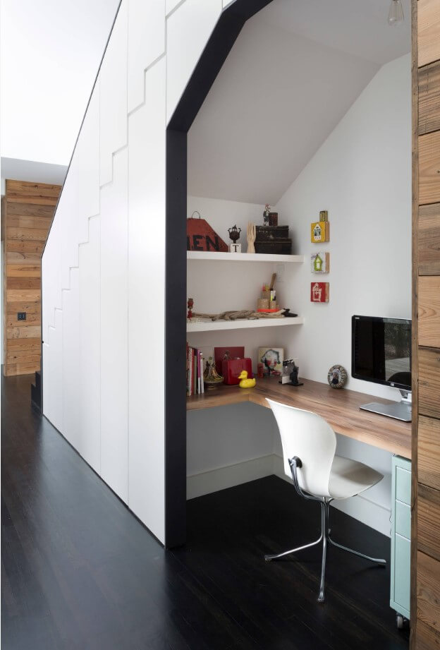 Desk under the stairs designed by By Hugh Jefferson Randolph Architects in Austin, TX