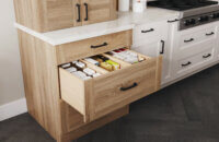 A deep kitchen drawer with dividers for organized pantry storage.