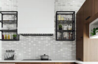 A bright white modern wood hood with a full wall backsplash and two open metal shelves in a matte black finish.