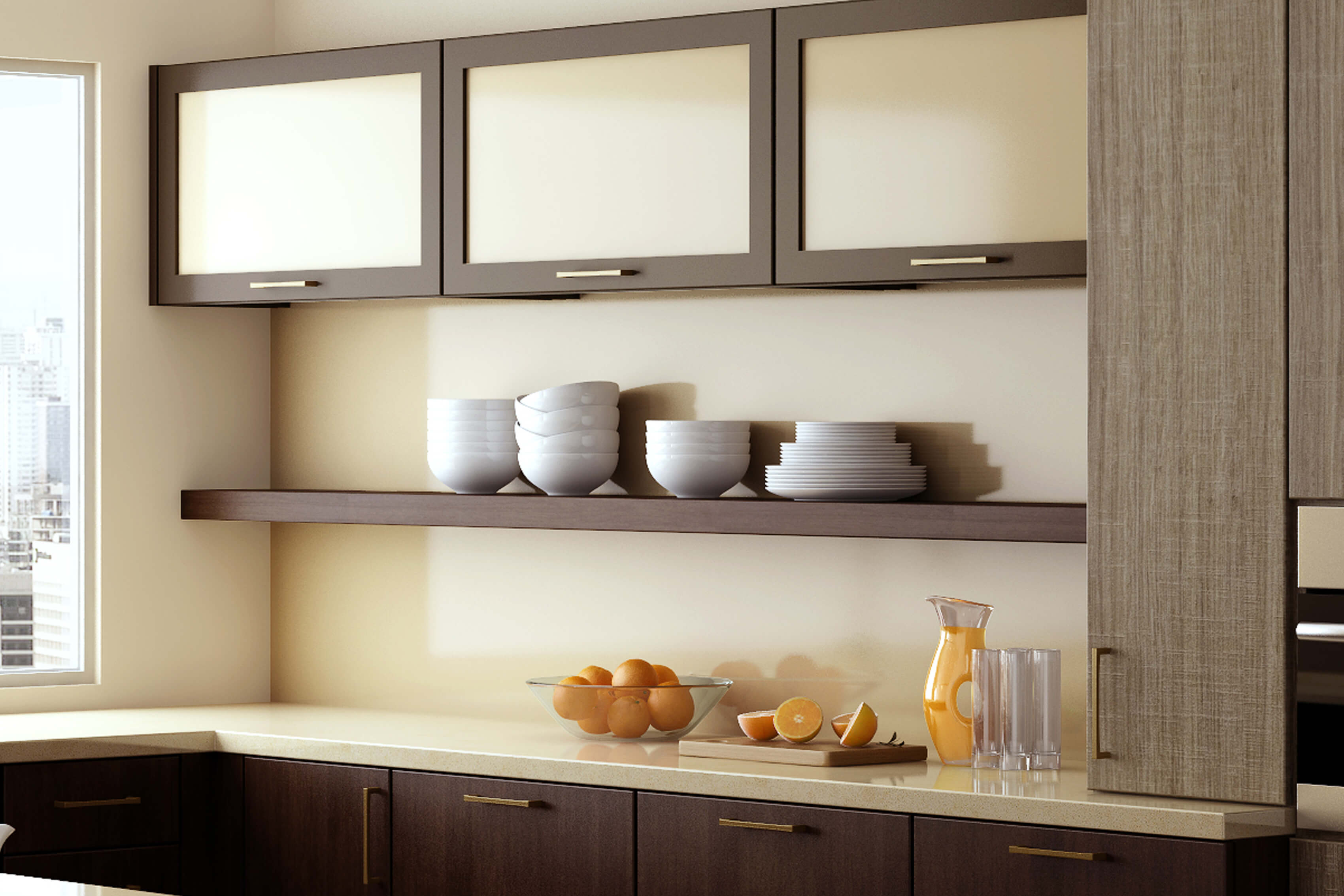 This luxurious, lofty kitchen features glimmery hints of brushed brass with horizontal wall cabinet doors with satin glass doors. A long floating shelf below the line of wall cabinets creates a beautiful and accessible place for every day dishware.