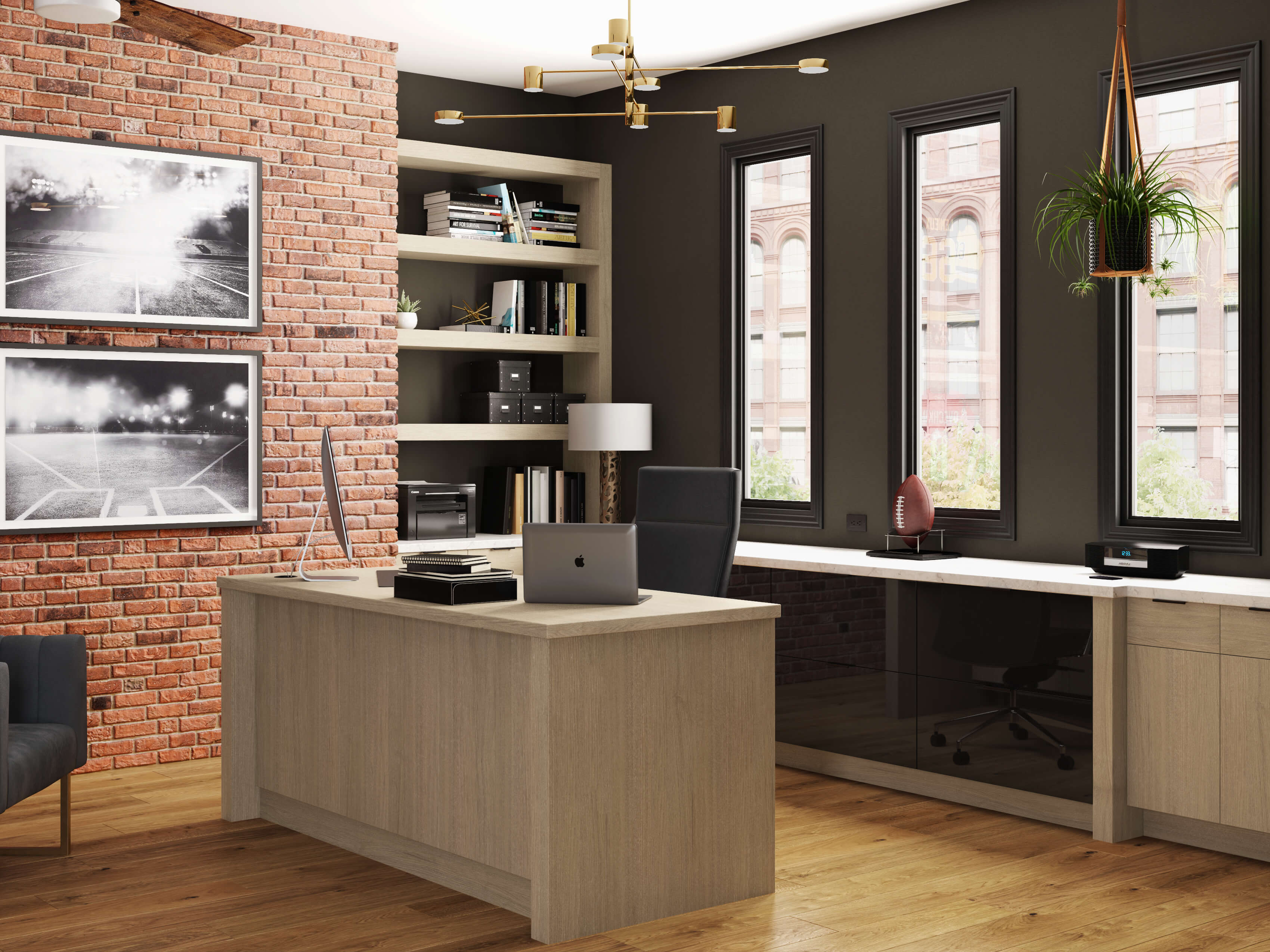 A home office desk with a free standing desk and l-shaped desk area behind with black acrylic cabinets and white oak cabinets.