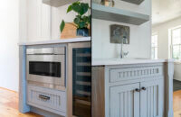 A beverage center on the left and a clean-up station on the right with gray painted cabinets with cottage beaded details on the cabinet doors.