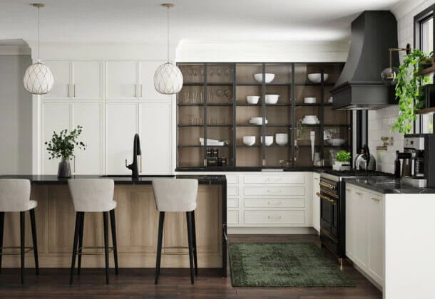 Glass cabinet doors with black metal door frames on white painted inset cabinets with a white oak cabinet interior, a skinny shaker style, and brass hardware.