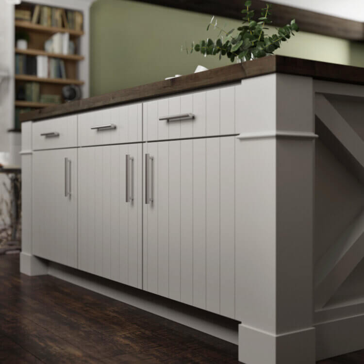 This new home features a scani style look using a shiplap slab door style in an off-white, light gray painted finish contrasted by ligth stained maple wood cabinets. The kitchen island has seating for three, a wood countertop, and a grand x patterned end cap with decorative columns for posts.