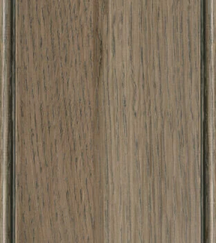 This finish color for Quarter-Sawn White Oak kitchen & bath cabinets is shown in the popular Morel stain by Dura Supreme Cabinetry. This medium cabinet color is a true-brown stain with a neutral brown-gray undertone.