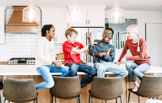 A kitchen cabinet review from a family of 6. kitchen island and happy with their new kitchen from Dura Supreme Cabinetry!