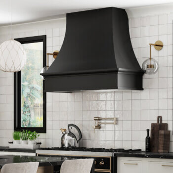 A sleek curved wood hood painted black with a solid/plain frieze with elegant molding details.