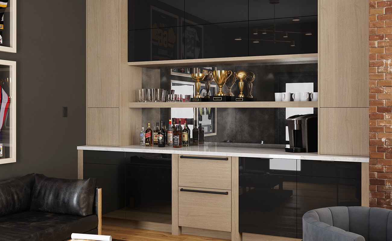 This urban home office combines ultra modern and industrial inspired details. This wet bar area in the office entertains company in a classy way. The bevrage station features high gloss black acrylic cabinet doors contrasted by a light stained quarter-sawn white oak cabinets. the slab cabinet door styles create a sleek and modern look. The mirror backsplash complements the glossy cabinet finishes.