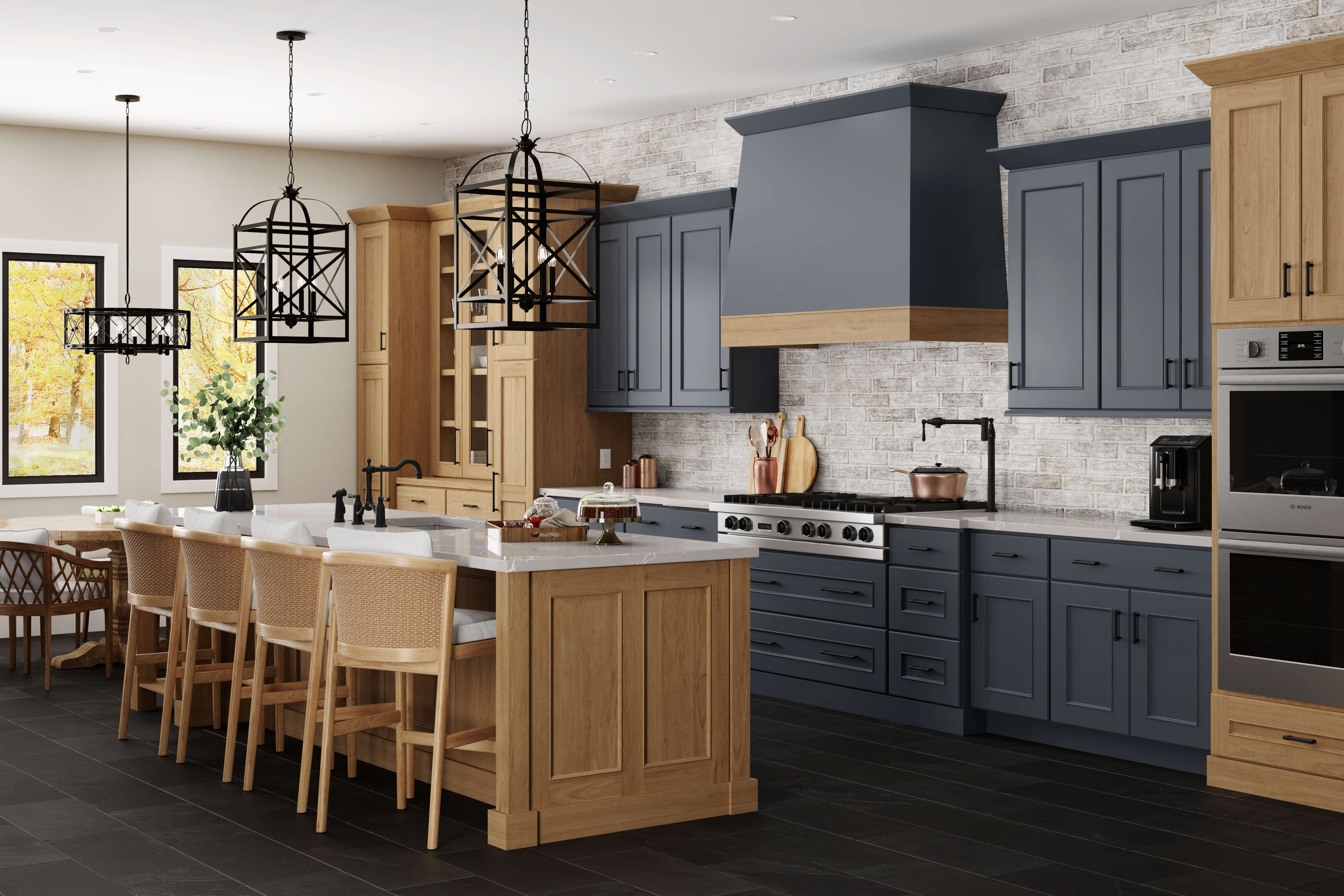 A remodeled kitchen with a modern take on the Old English interior design style. This design features deep blackish navy blue painted cabinets around the cooking space and on the wood hood surrounded by light stained cherry cabinets and wood accents. The kitchen cabinets use a framed construction method with full overlay door that have a flat panel style.