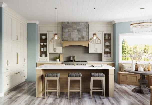 This dreamy lake house kitchen captures the home’s lake shore lifestyle with watery blue walls, shiplap ceilings, nature-inspired wood and white painted cabinetry, and natural stone accents. The kitchen design uses a natural off-white paint color contrasted by a light white washed stain on Quarter Sawn White Oak cabinets.