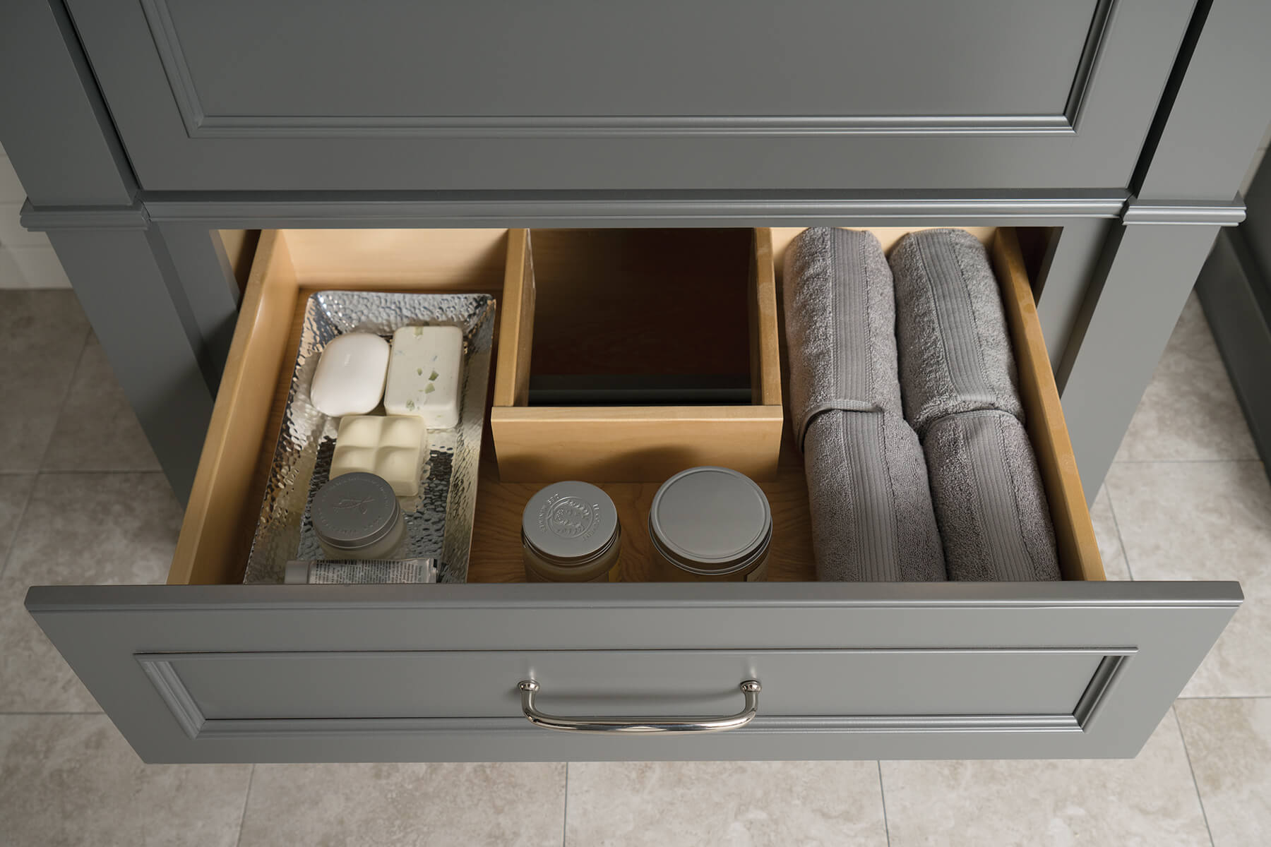 A plumbing drawer for a bathroom sink cabinet.