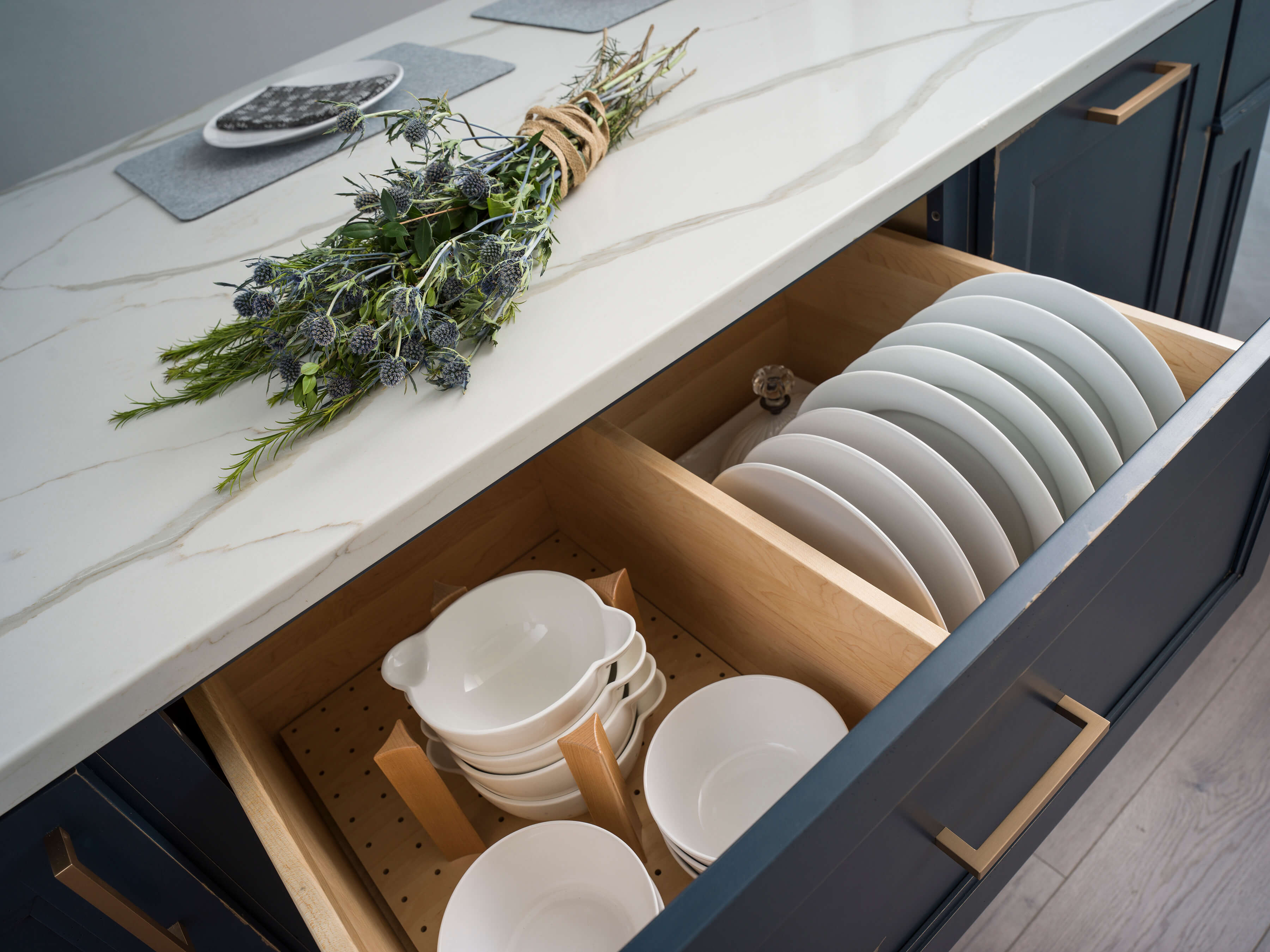 Dura Supreme’s Plate Rack combined with the Dish Storage Drawer creates a convenient spot to neatly store and organize an entire set of dishware. Storing your dishware collection below the countertop creates a more accessible option for all family members.