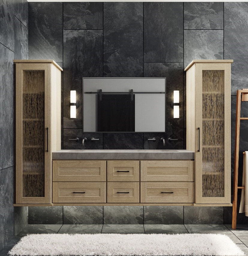 A floating vanity in a contemporary bathroom with a shallow shaker door style in a light raw quarter-sawn white oak color. Two tall floating linen cabinets flank each side of the vanity.