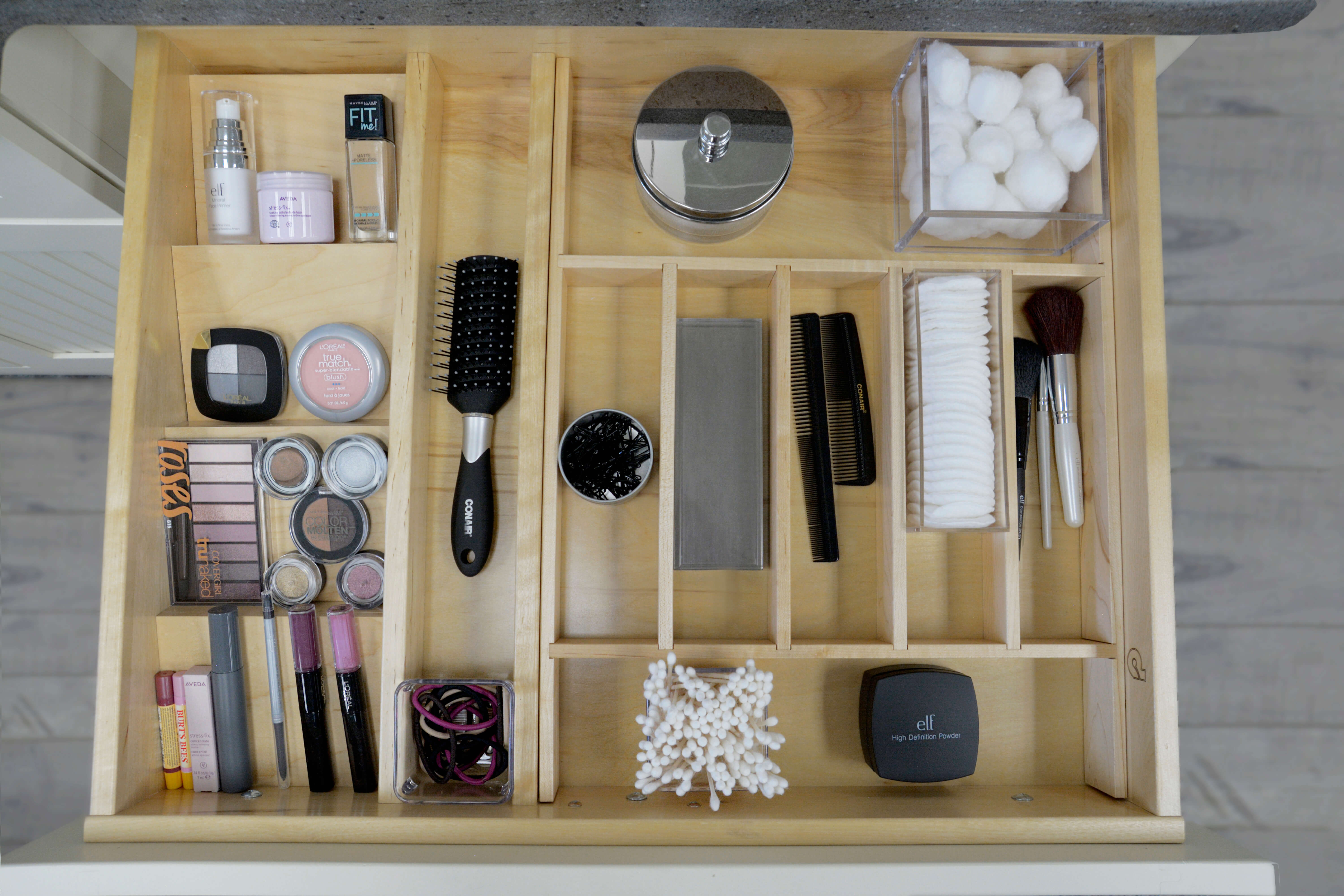 Organized drawer storage for makeup and cosmetics.
