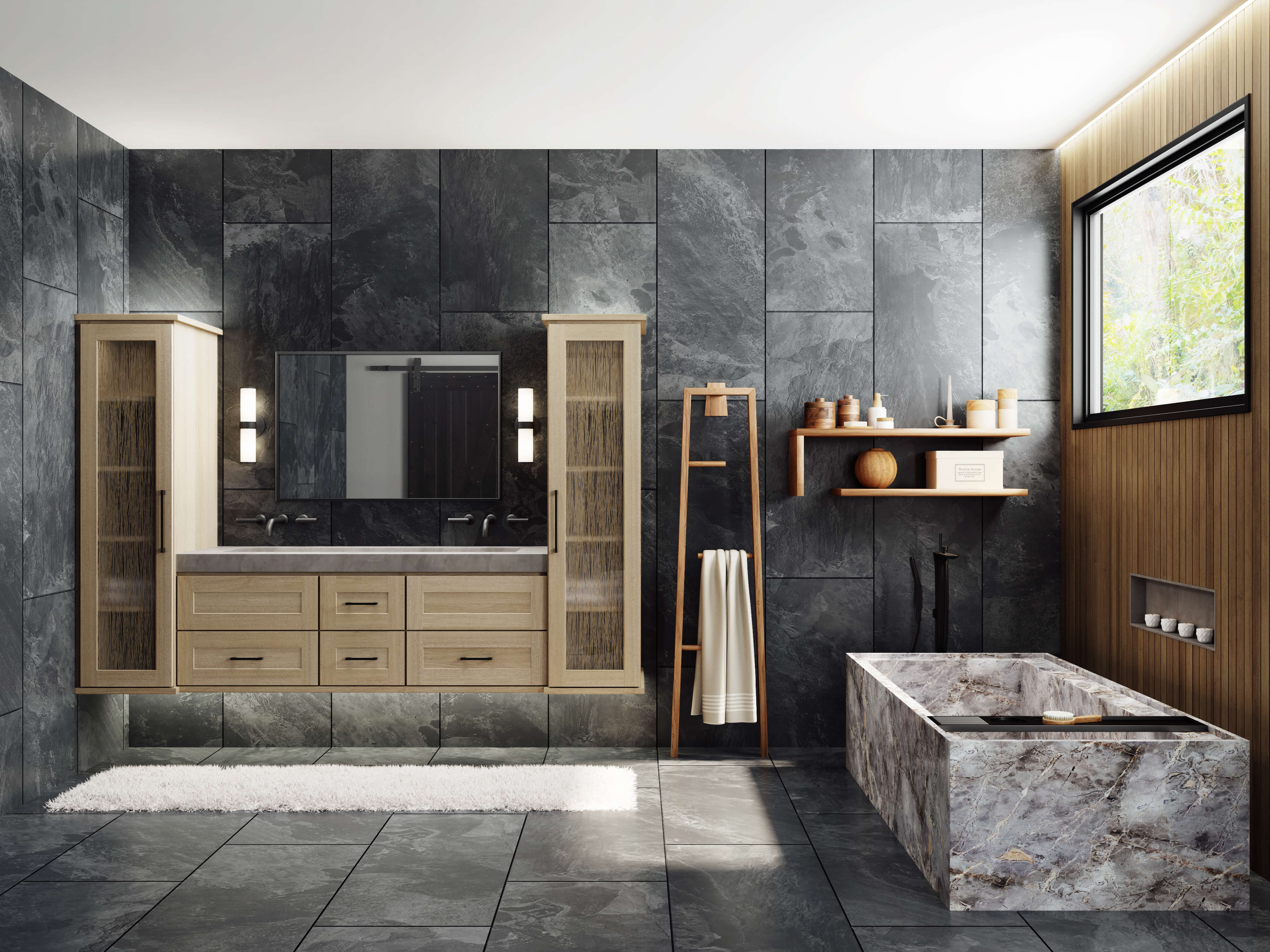 This monastic and intimate bathroom unites cool and warm natural tones with a shallow shaker cabinet door style in a light stained White Oak. Dark floor-to-ceiling tiles create a moody look.