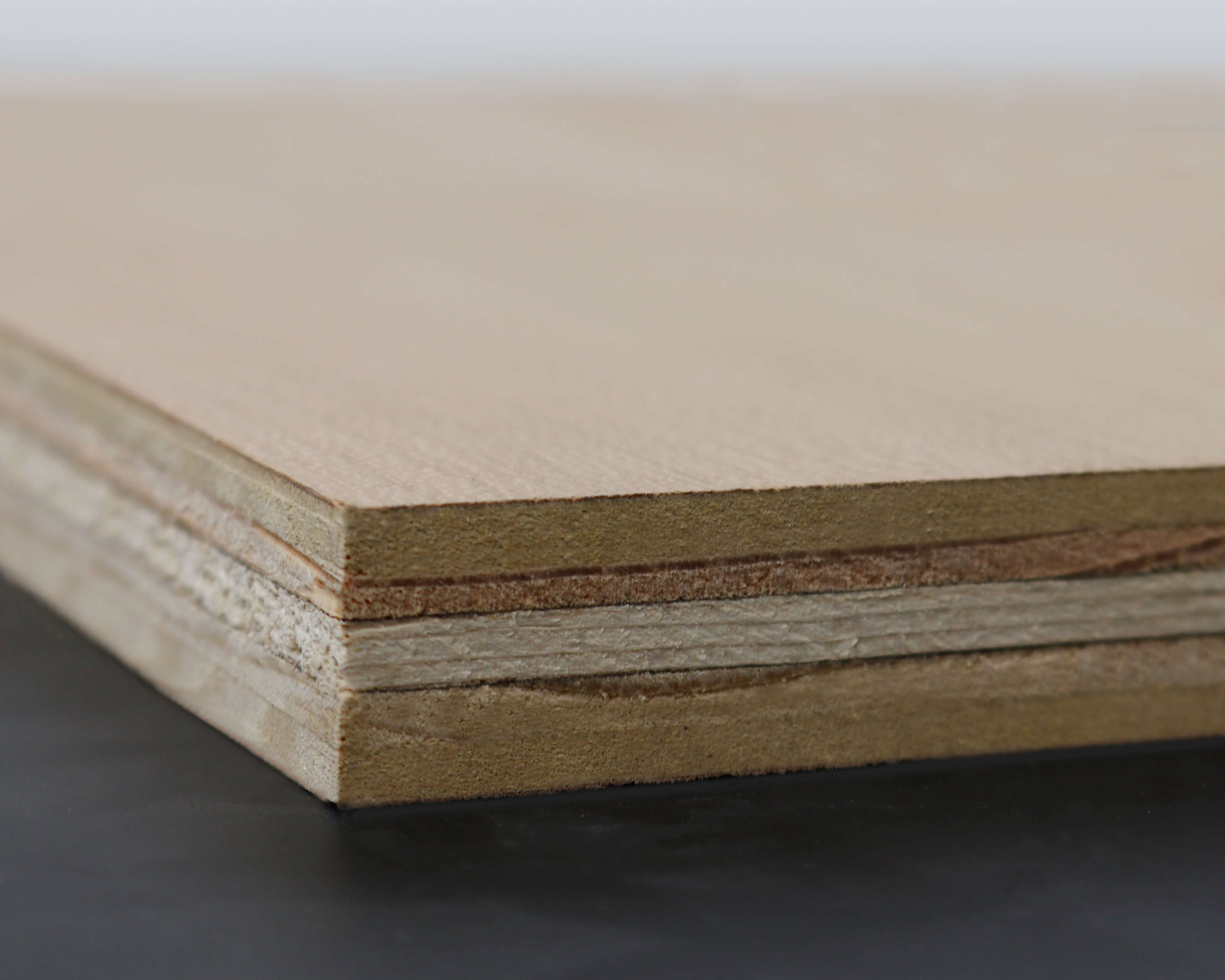 A close of of Plywood materials used for kitchen cabinet construction. What are kitchen cabinets made out of? Learn about cabinetry construction and the details that make a cabinet.