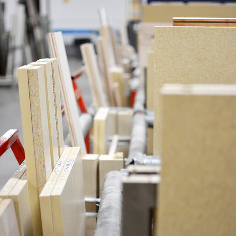 Kitchen Cabinetry parts and pieces in a cart ready for the cabinet assembly and build team to begin working on. Learn how cabinets are crafted at the Dura Supreme Cabinetry factory in Minnesota, USA.