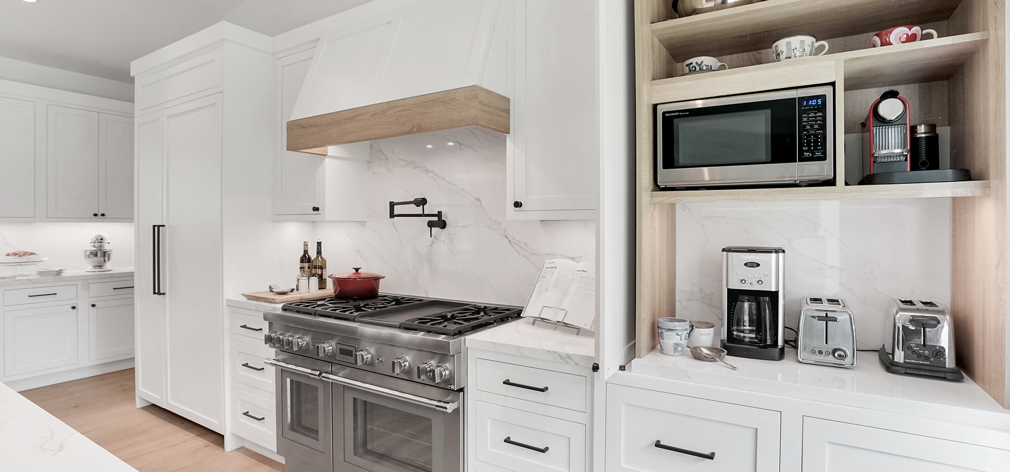 A trendy kitchen design with creative kitchen storage for kitchen appliances.