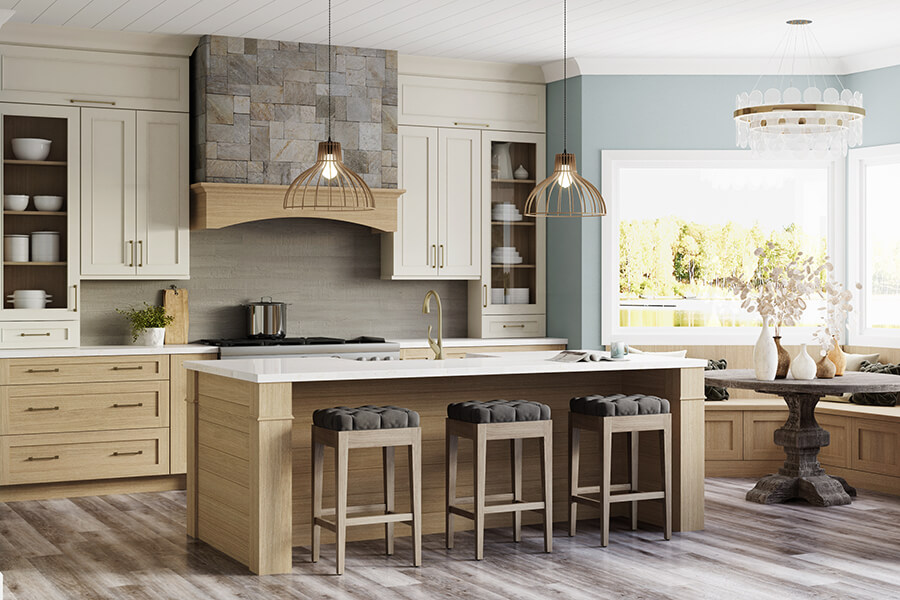 A lake house kitchen with a nature inspired color palette with raw wood finishes an soft white painted cabinets.