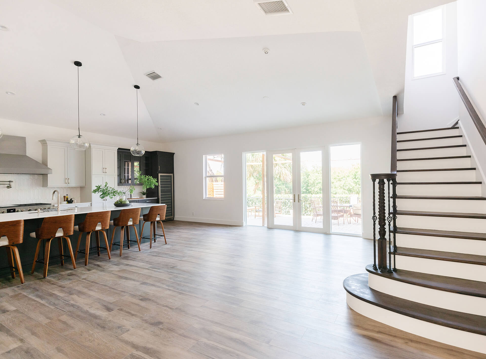 The new location of the midcentury modern kitchen design with lots of natural light.