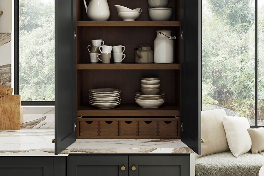 This working pantry cabinet sits at countertop height and provides a work space as well as lots of kitchen storage.