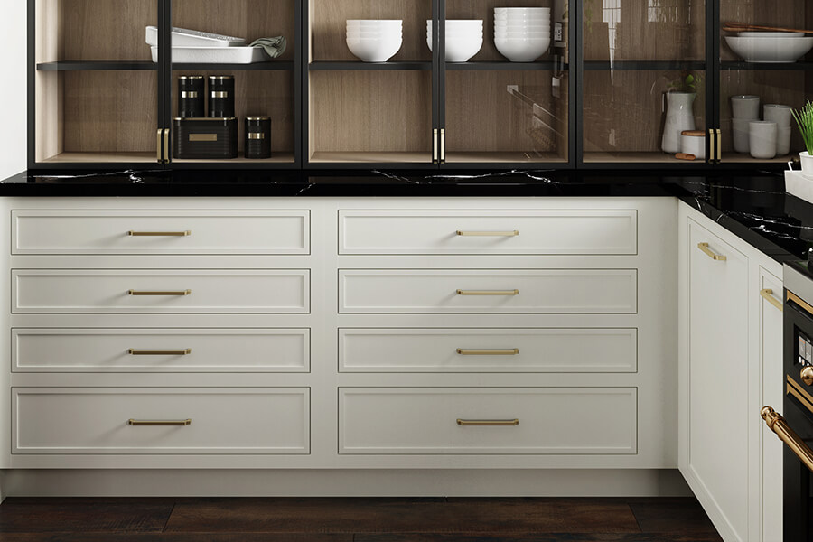 A white painted kitchen with skinny shaker doors with inset construction.