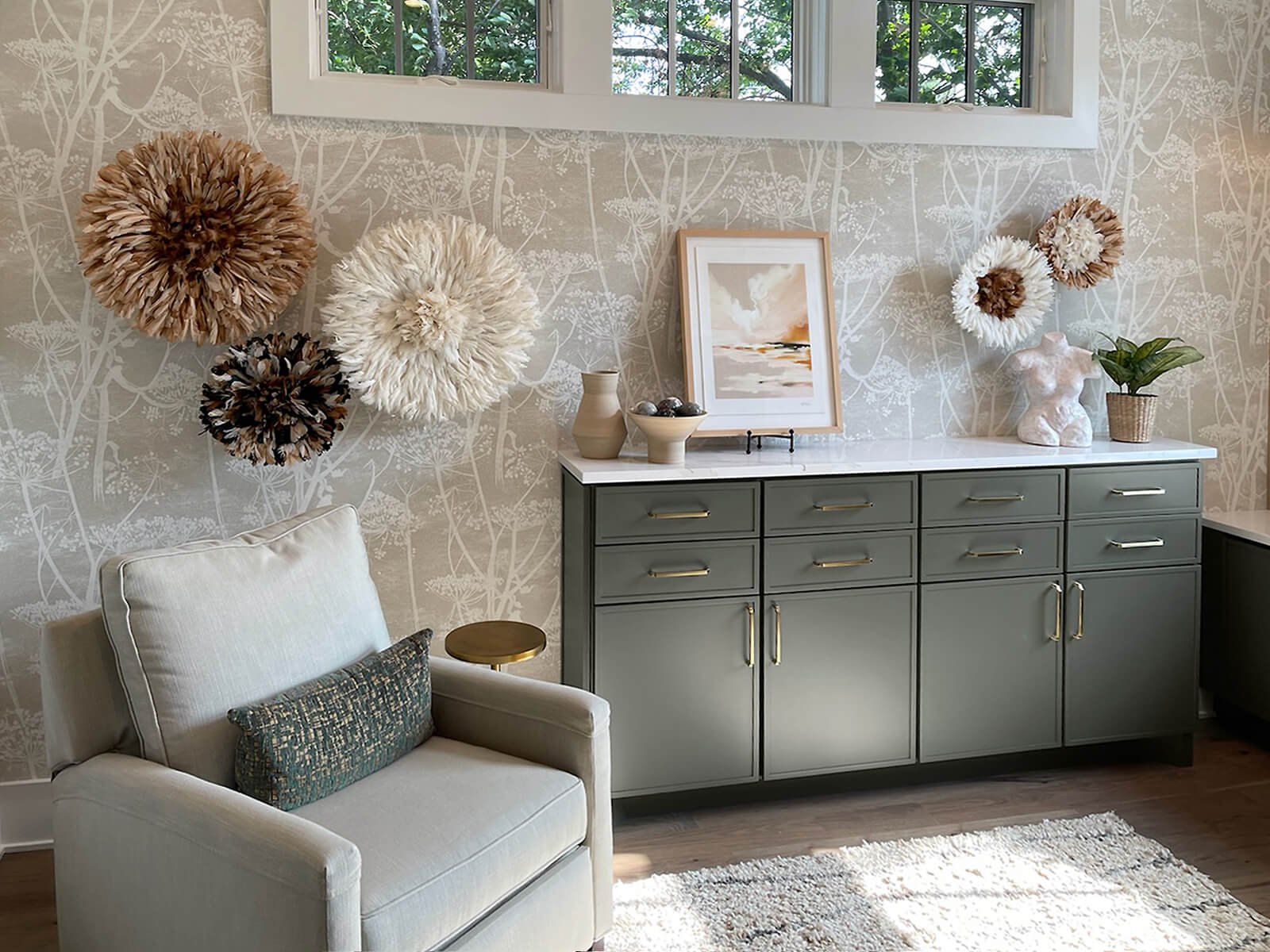 Extra storage in a beautiful home office was created with shallow green painted cabinets.