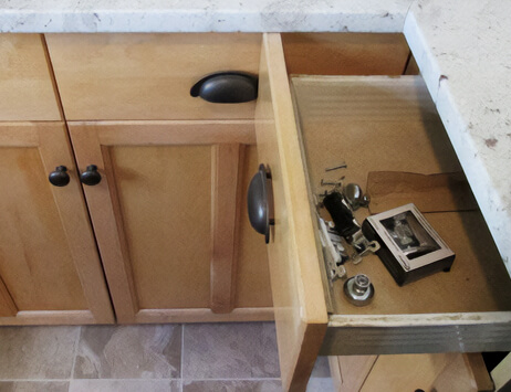 The size of the cabinet hardware was not considered in the design now the corner drawers both can't open all the way.