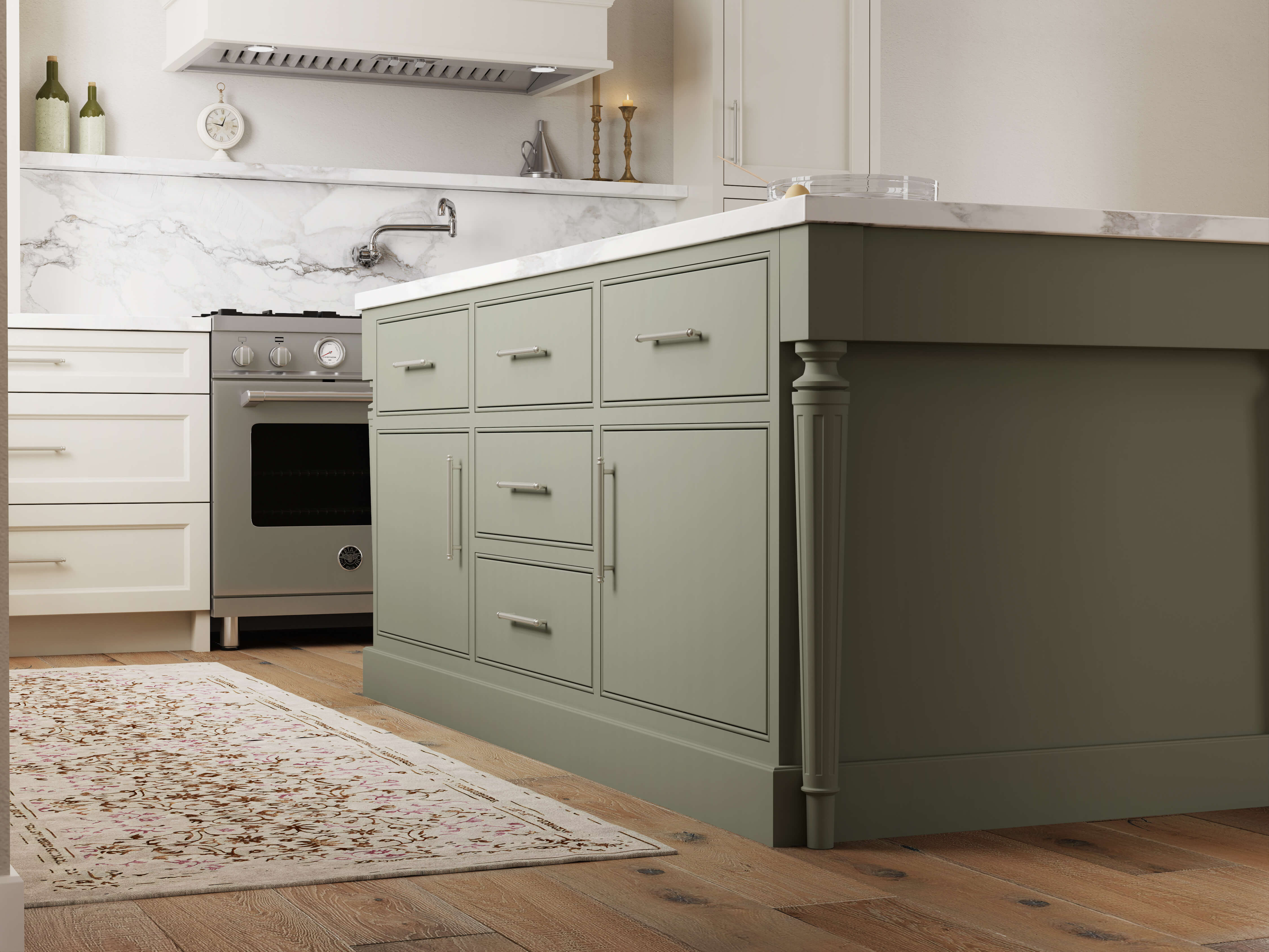A green painted kitchen island with a furniture style look and slab inset cabinet doors with a beaded frame.