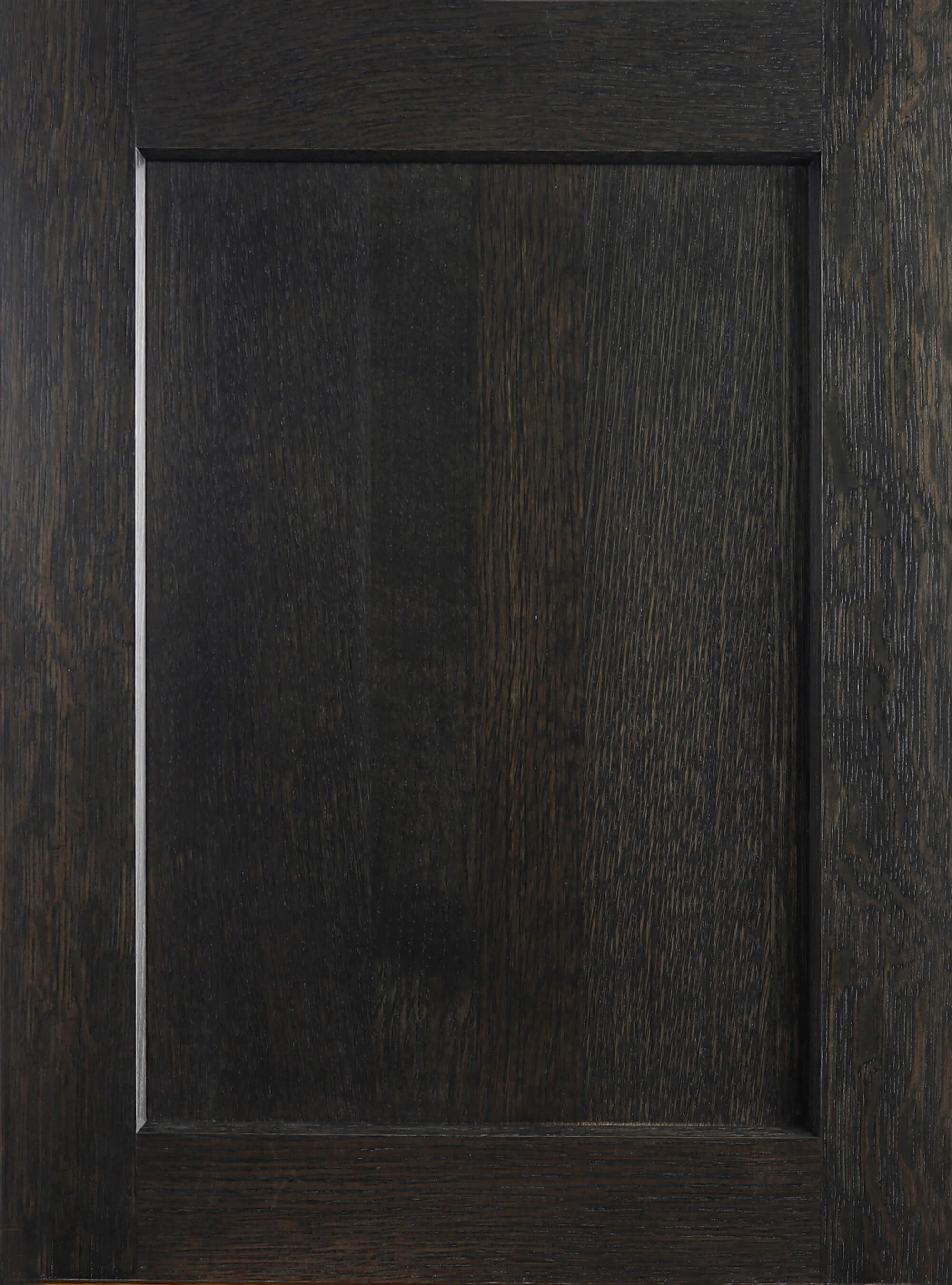 An almost black stained shaker cabinet door with Quarter-Sawn White Oak wood.