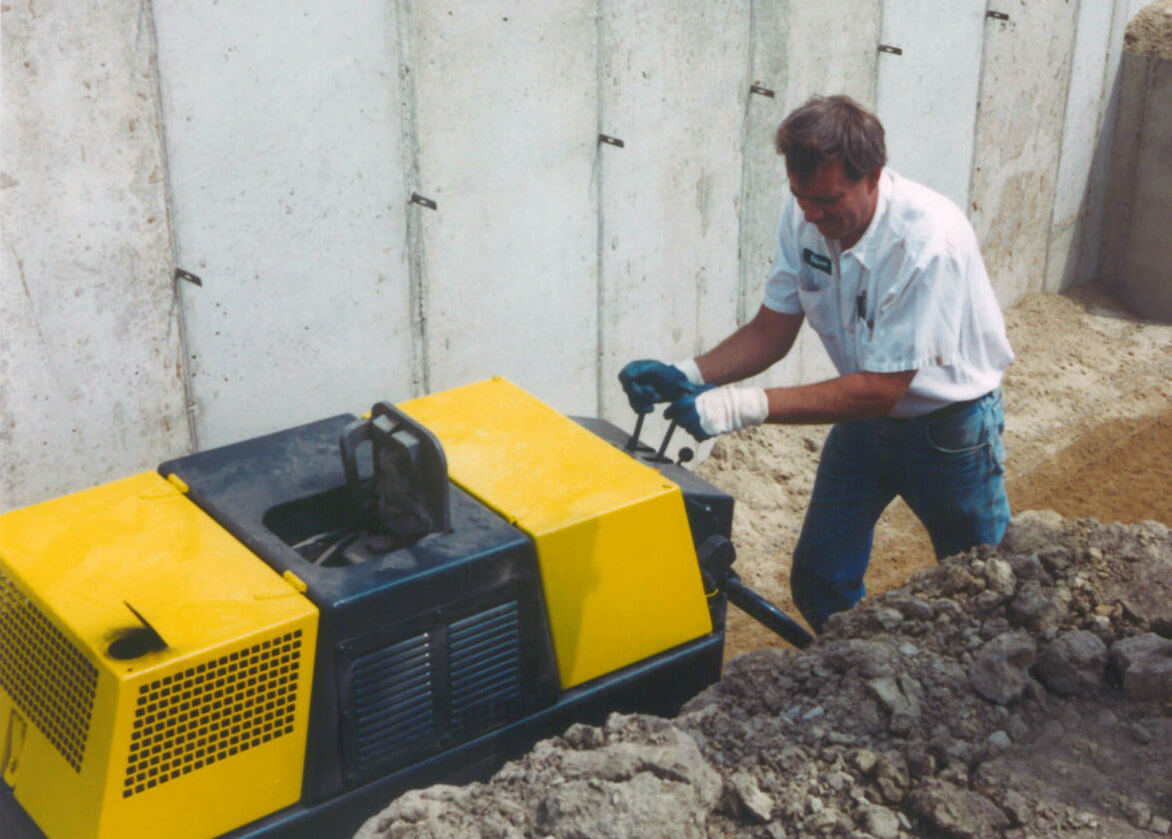 Employee helping with the construction of the building 50 years ago.