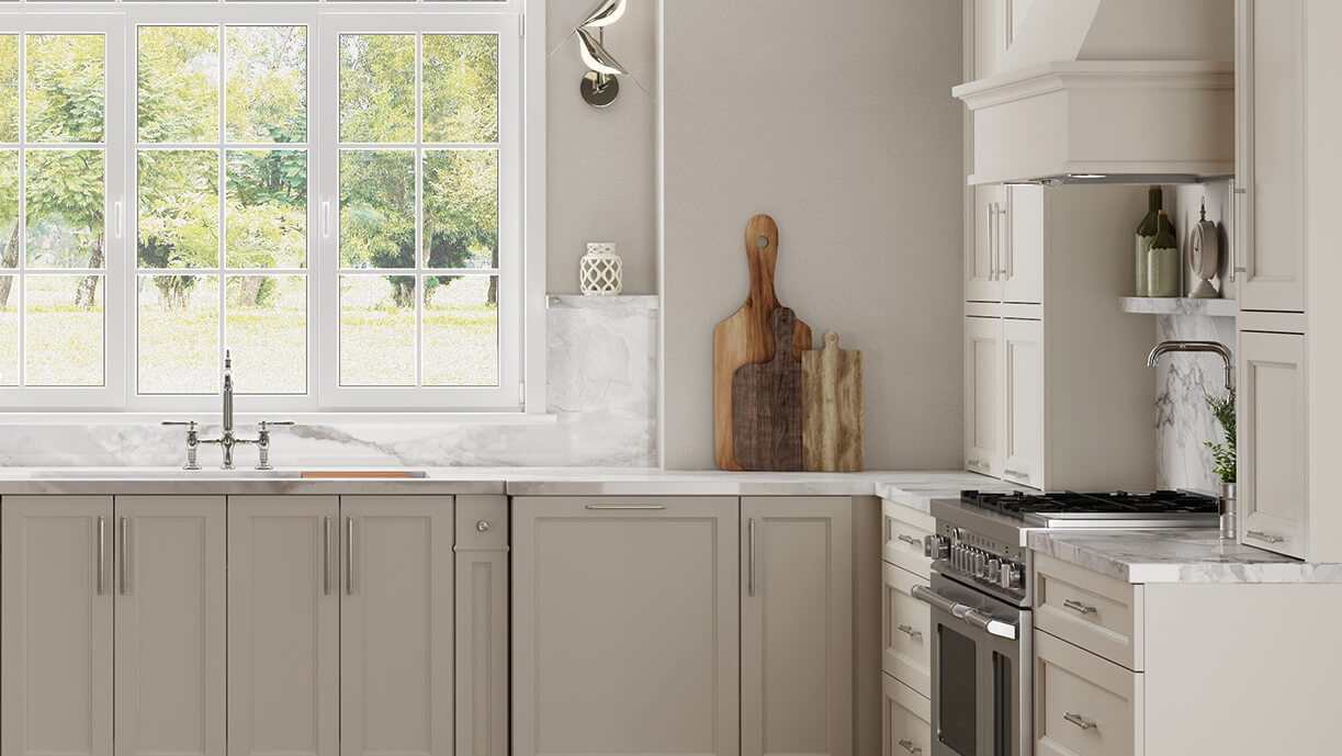 A luxurious off-white painted kitchen with a dramatic flat panel cabinet door.