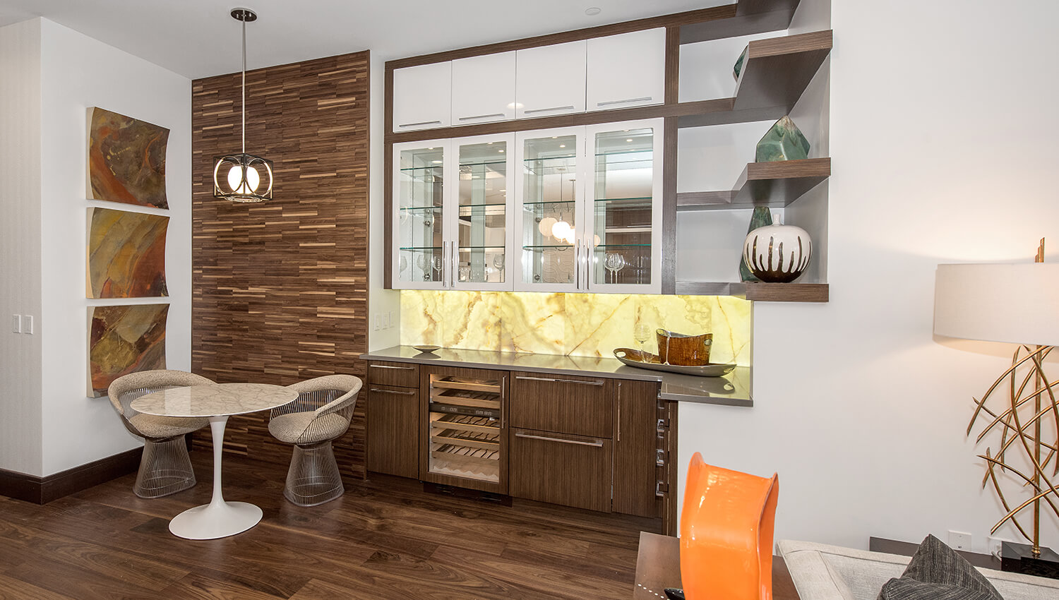 A wet bar area with mid-century modern styled cabinets.