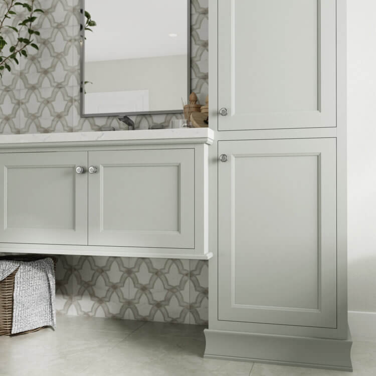 A pretty all gray bathroom with a gray-green undertone used throughout the design.