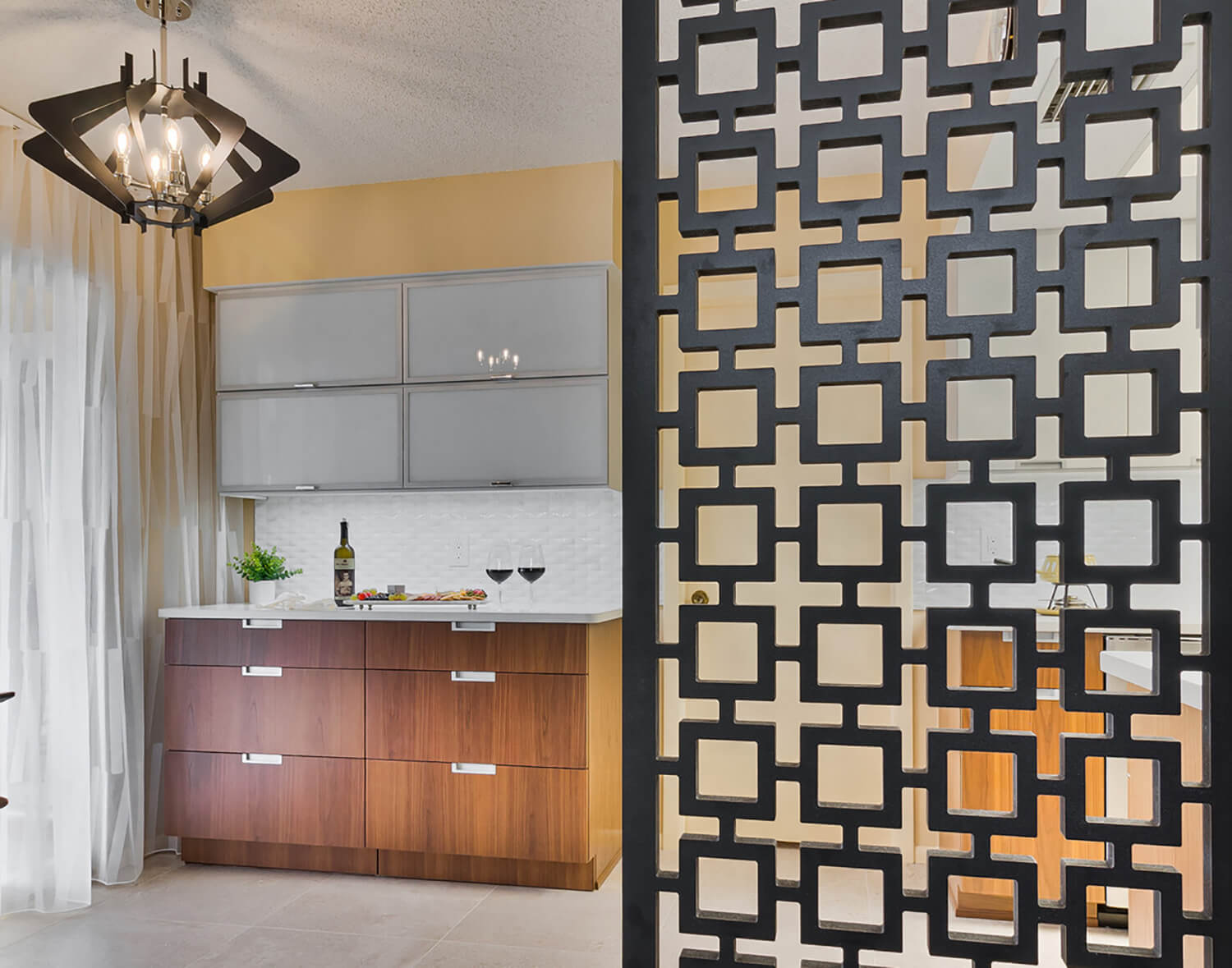 A mid-century modern styled kitchen design using geometric shapes as accents.